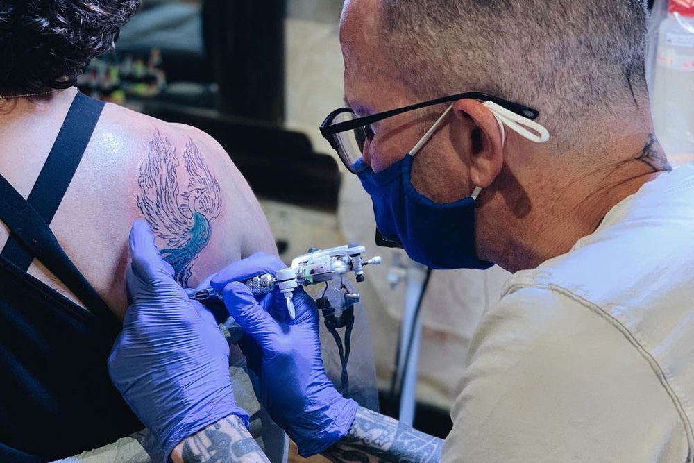 Patrick Conlon tattooing